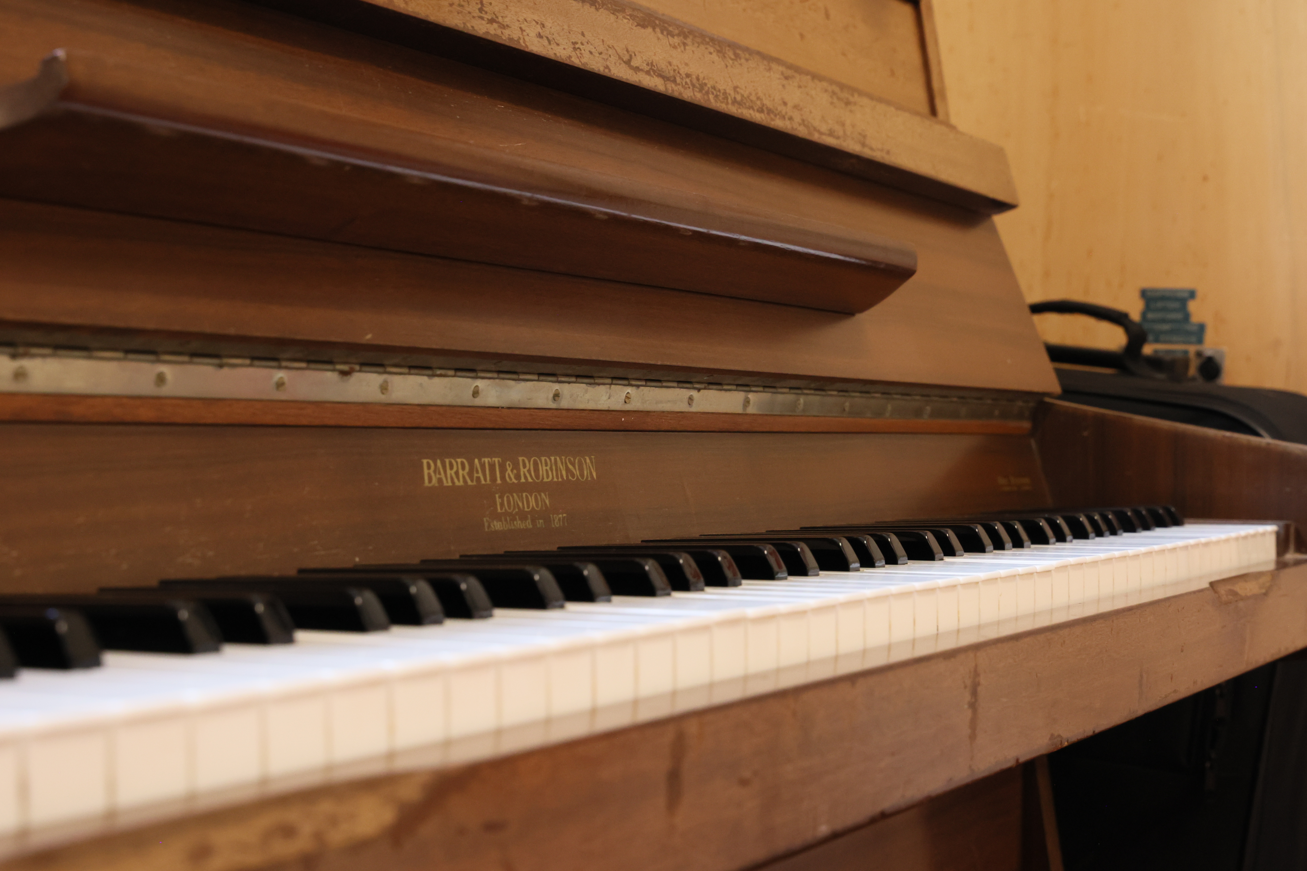 Piano in back hall
